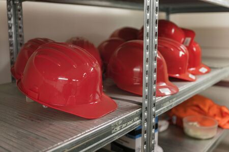 Plastic red helmet on the shelves.の写真素材