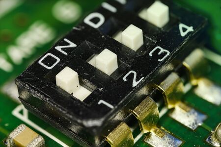 Microswitches on printed circuit board.