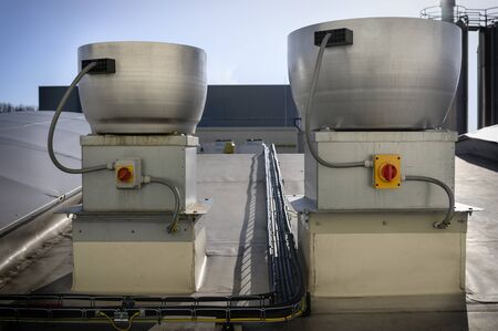 Electric exhaust fans on the roof.