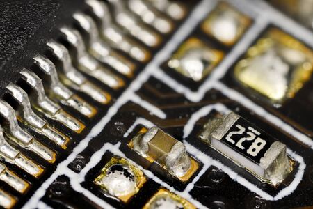 Miniature resistors on computer motherboard.