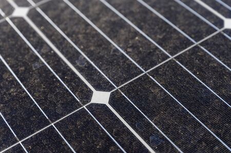 Dusty solar panel boards in detail.の写真素材