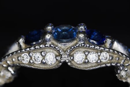 Blue sapphires in an engagement ring with zircons.
