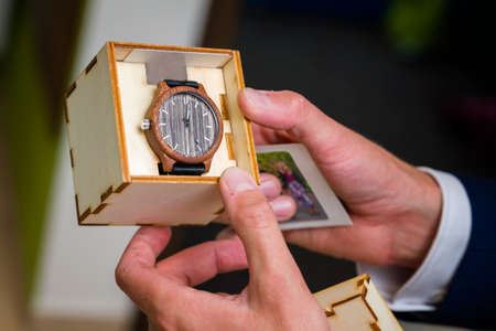 Men's wooden wristwatch as a gift.の写真素材