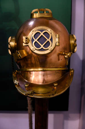 A brass helmet old from a diver.の写真素材