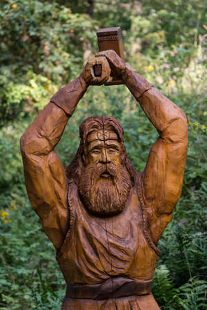 Wooden statue of the sun god Svarog.の写真素材