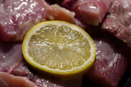 Lemon slice on chopped fish.の写真素材