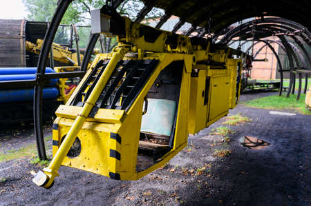 Mining locomotive with wagons suspended - demonstration on the surface.