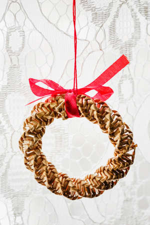 Hanging straw ornament on the curtain.の写真素材