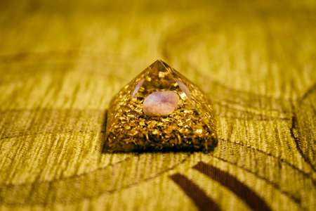 Orgonite pyramid with amethyst in detail.