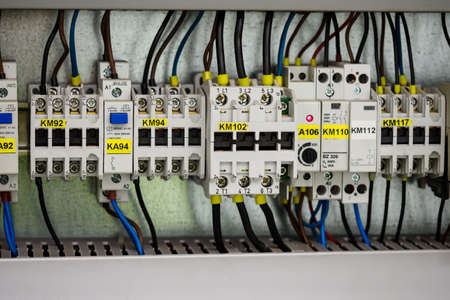Contactors connected in the switchboard next to each other.