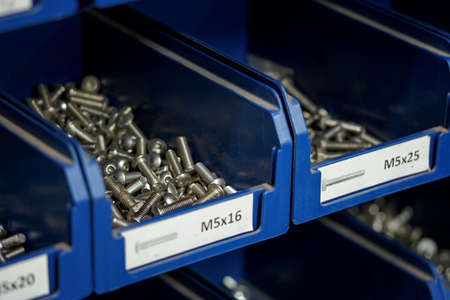 Hexagon socket head cap screws in a box.の写真素材