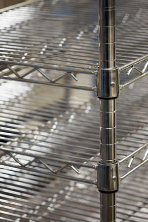 Detail of the legs of a metal rack.の写真素材