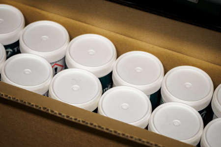 Paper box with cream tubes.