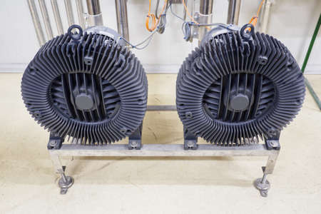 Two circular pumps next to each other on the console.の写真素材