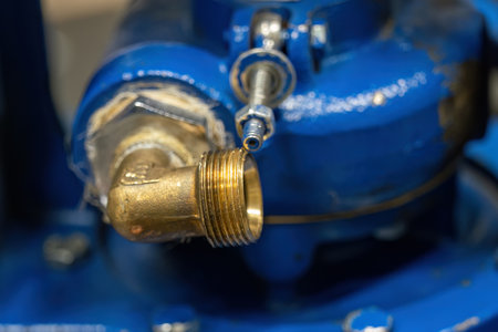 Brass thread on pump fitting.の写真素材