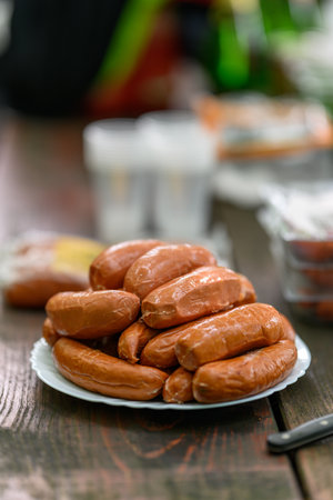 Sausages on a plate outside.の写真素材