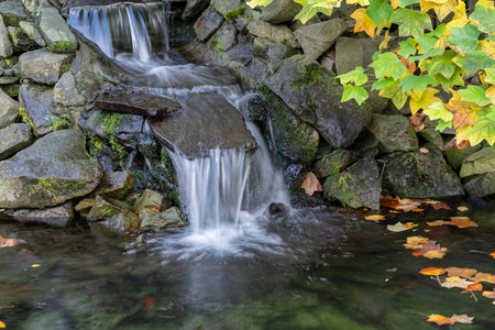 A small waterfall artificially created by the lake.