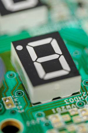 Close-up of electronic circuit board with digital number, selective focus