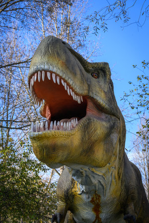 Dinosaur in the park, close-up of a dinosaur head
