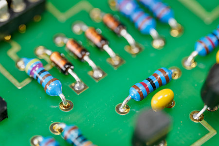 Color-coded resistors on the circuit board.