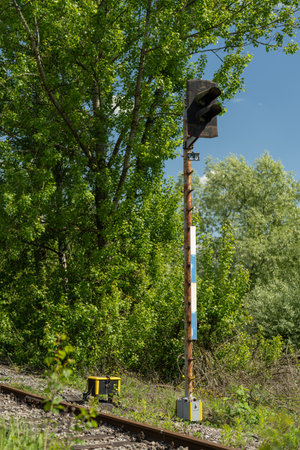 Railway signal post outdoors on a sunny day.の写真素材