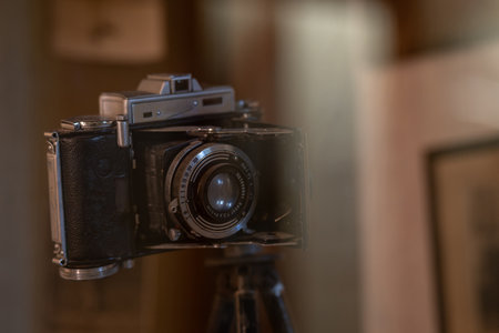 An old retro camera displayed in a museum.の写真素材