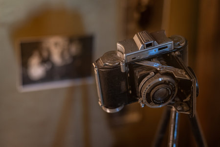 An old retro camera displayed in a museum.の写真素材