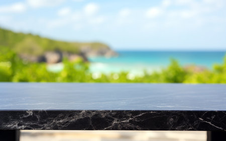 Black marble table top on blurred tropical beach island and seascape blurred background. High quality photoの素材