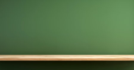 Empty top of wooden shelf on green wall background. For product display. High quality photoの素材