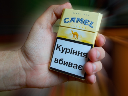 Camel cigarettes with an inscription in Ukrainian smoking killsのeditorial素材