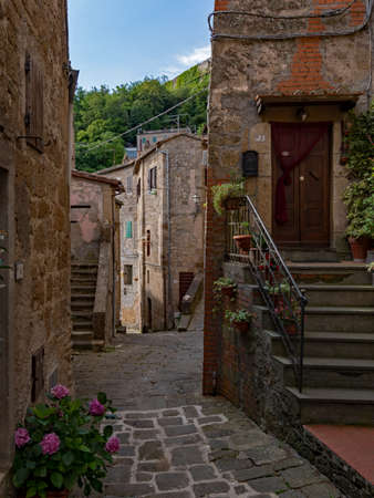 Lonely street at the old town of Sorano at the Tuscany Region in Italyの写真素材