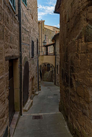 Lonely street at the old town of Sorano at the Tuscany Region in Italyの写真素材