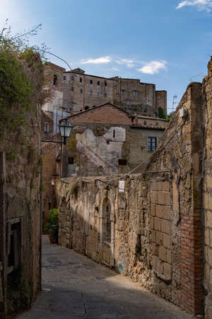 Lonely street at the old town of Sorano at the Tuscany Region in Italyの写真素材