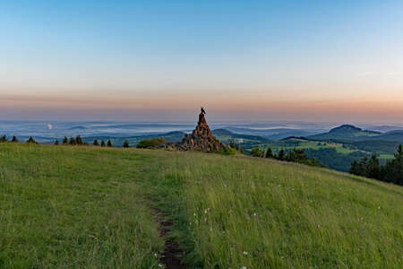 Sunrise at the Aviator Monument at the Wasserkuppe in Hesse, Germanyの写真素材