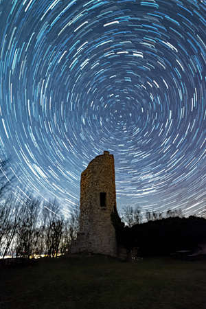 Startrails over Ebersburg Castle at Poppenhausen in Hesse, Germanyの写真素材