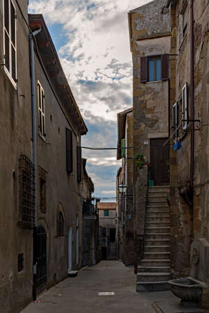 In the streets of the beautiful old town of Pitigliano, Tuscany Region in Italyの写真素材
