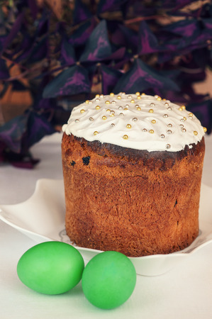 Easter Cake and Painted Eggs on tableの写真素材