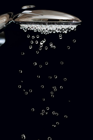 Water drops from headshowers close upの写真素材