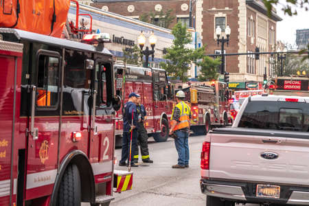 Chicago, IL - October 6th, 2021: Firetrucks and other emergency response vehicles crowd the streets...