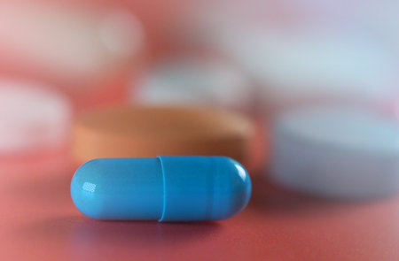 macrophotography of tablets, medicines and vitamins, food supplements, concept of medicine, vaccination, healthy lifestyle, the idea of human health, coronavirus vaccine, COVID-19, treatment of coldsの写真素材