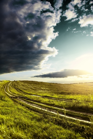 The road and sunset in the villageの写真素材