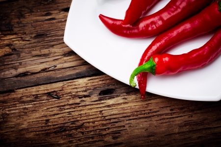 some chili peppers on a plateの写真素材