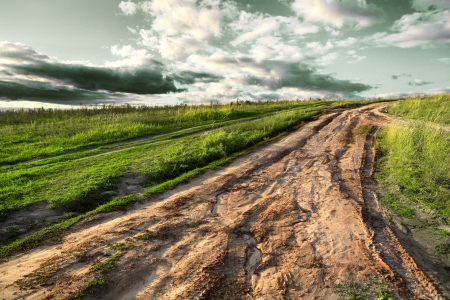 The road and sunset in the villageの写真素材