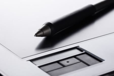 Grip pen on graphic tabletの写真素材