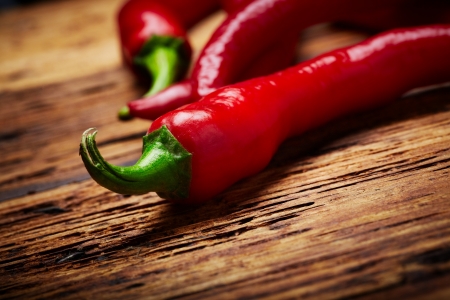 some chili peppers on a tableの写真素材