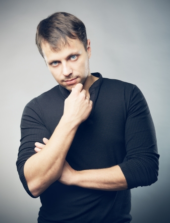 Young man with thoughtful expressionの写真素材