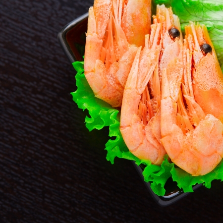 Shrimps and salad on a plateの写真素材