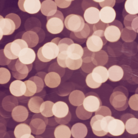 Abstract defocused violaet sparkles backgroundの写真素材