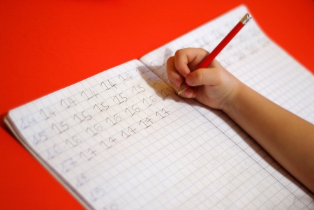 child who performs taskの写真素材