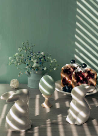 Easter is the bright and kind holiday with the spring breath. Eggs, cakes and rabbits are the main symbols of this day.の写真素材
